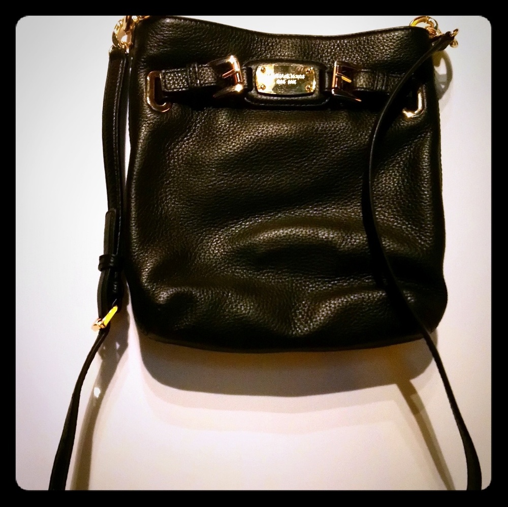 Michael Kors black purse with gold chains, strap